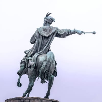 Defending climate progress in a wartime economy